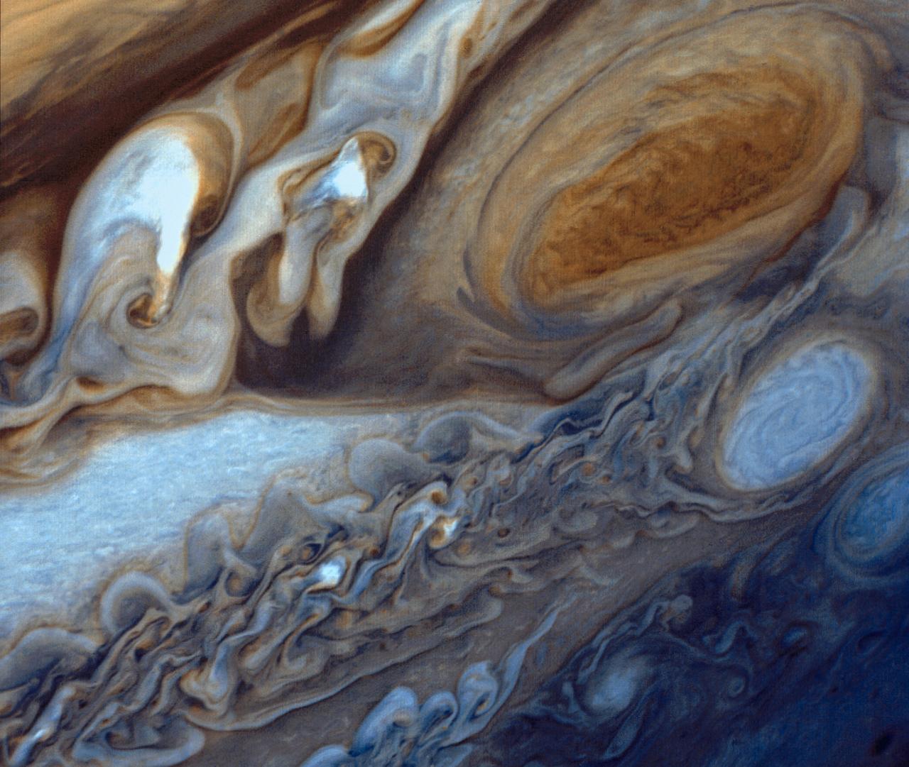 Galileo spacecraft mosaic of Io, a volcanic moon whose motion once timed light.